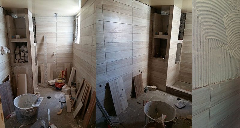 Κατασκευή χτιστής ντουζιέρας με ράφια και τοποθέτηση πλακιδίων σε ανακαίνιση μπάνιου στον Ταύρο